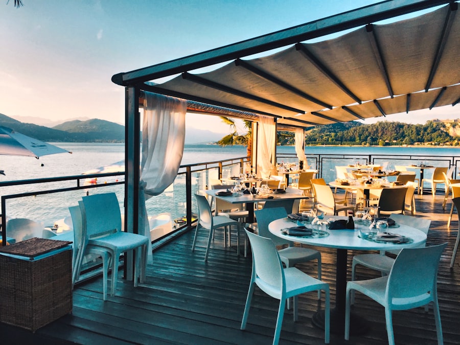 The rooftop terrace, tables set above the harbour.